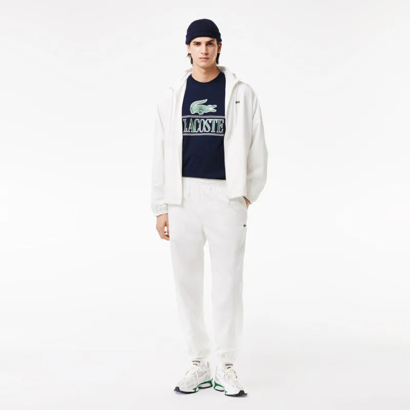 BONNET COTELÉ LACOSTE EN LAINE UNI MARINE